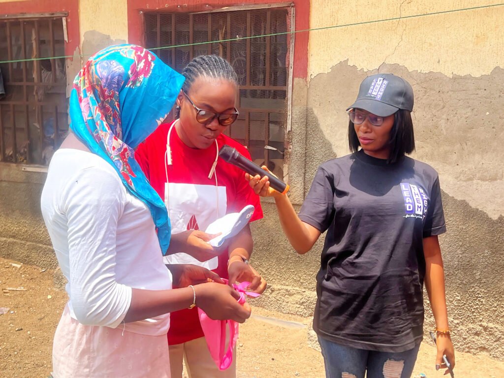 A team member of Menstrualdemy conducting a practical demonstration session during one of our outreaches. 